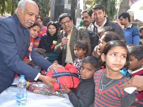 Chairman distributed disabled children sweater