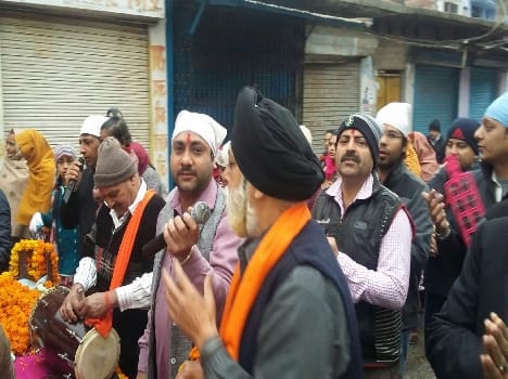 Laddu Gopal Guru Granth Sahib and led out into the morning walk