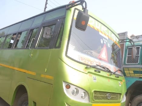 Transport Corporation buses painted on roadways dares screws