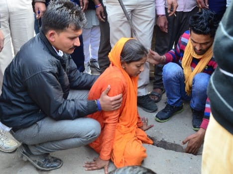 woman leg stuck in slab hole.