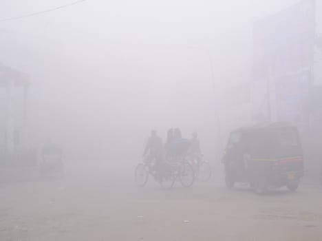 Dne of the city is covered by fog in the morning