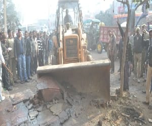 JCB walked on illegal encroachments.
