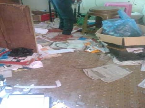 Cash and goods stolen from shops
