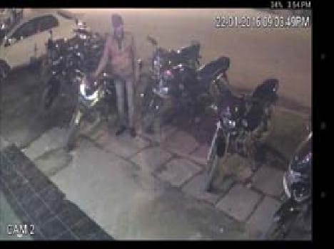 Crooks steal the bike outside the guest house caught on CCTV
