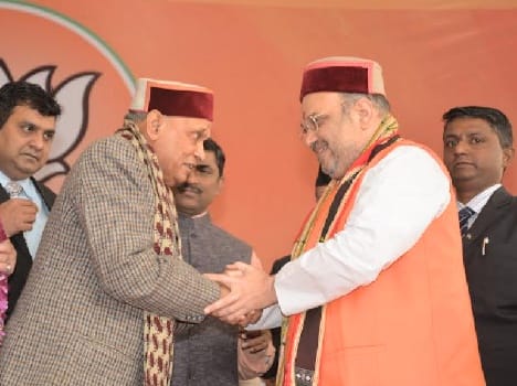 prem kumar dhuaml greets Amit Shah