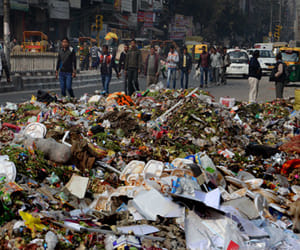 Door to door garbage workers strike ends.