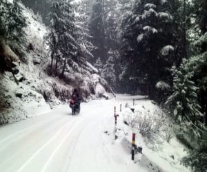 road block in snowfall.