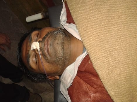 Police beating of a heart attack merchant manure