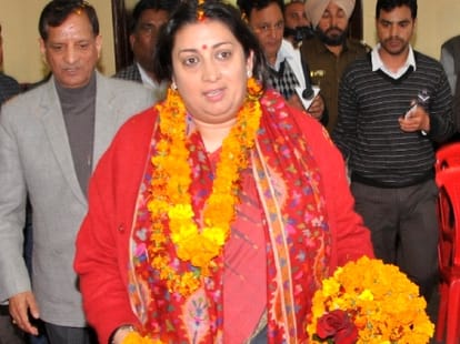 hrd minister smriti irani hits out at rahul gandhi