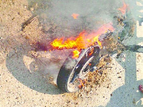 Burnt bike in a road accident