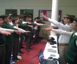 Children take oath to follow rules of the road.