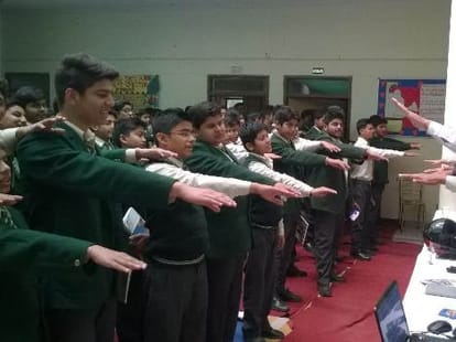 Children take oath to follow rules of the road.