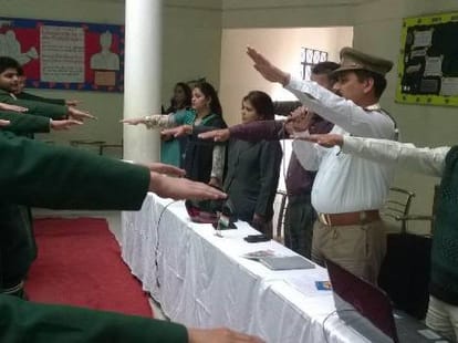 Children take oath to follow rules of the road.