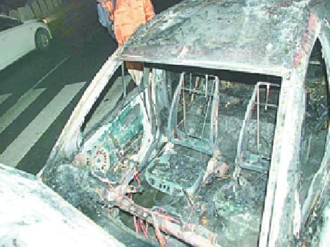 Dividers hit by car on fire