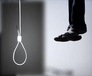 Boys commit suicide after written note on his hand.