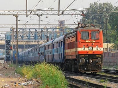 women travellers push tte from running train