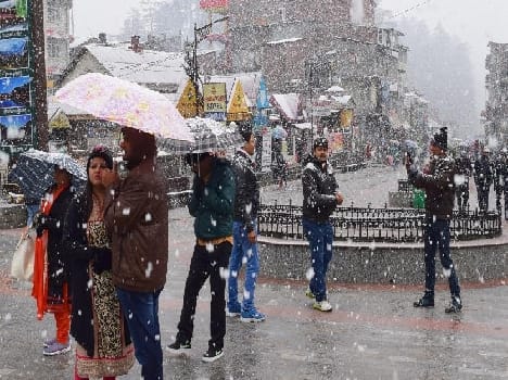 tourist enjoy snowfall