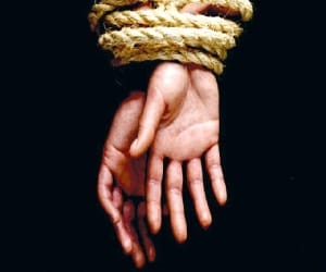 young woman working at home, kidnapping