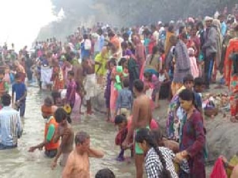 people bathing in river mau