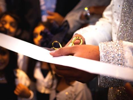 fights during ribbon cut cermony in marriage.