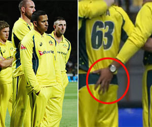usman khwaja having bad manner during national anthem song