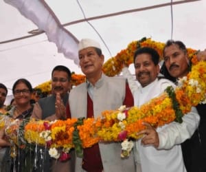uttarakhand cm say no to new tax.