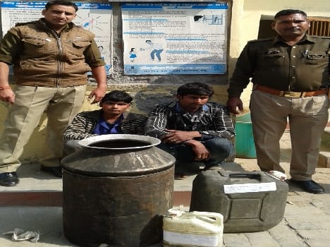 two arrested with the alcohol factroy