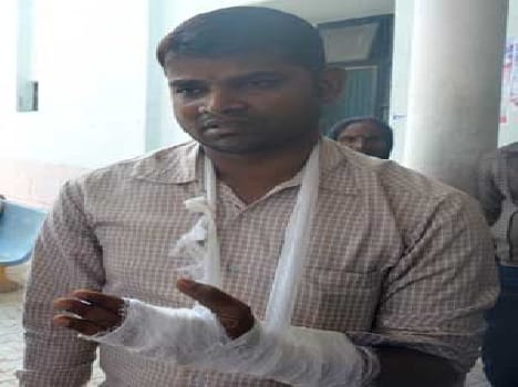 Beaten by policemen on bikes 