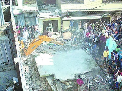 Horrific explosion demolished a house , killing six