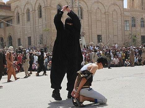 ISIS execute a 15-year-old boy by beheading after he is caught listening to western music in Iraq 