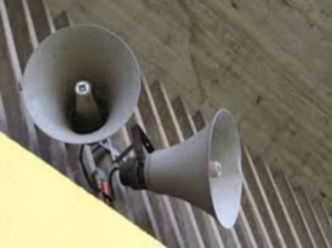 City Magistrate reached school battle of loudspeakers.