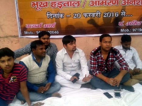 People sitting on a hunger strike to open the college engineer