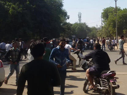 abvp activist protest and fired against jnu teacher