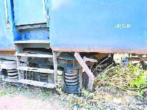 Dead and broken down by the tracks of washing line coach