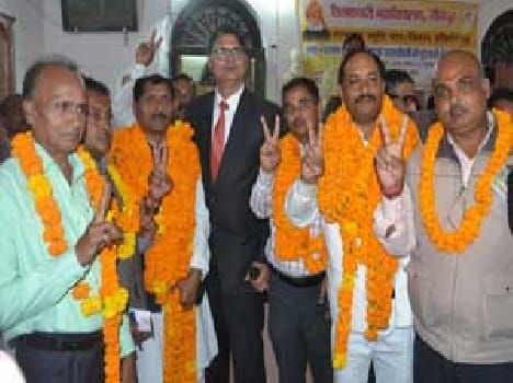 DR . SB Singh became president