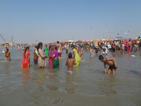 Magi dip in the Ganges caused by millions of devotees at the full moon