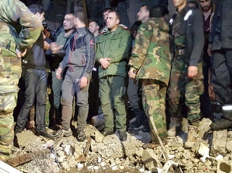 ISIS blasts kill nearly 130 as US, Russia press Syria truce
