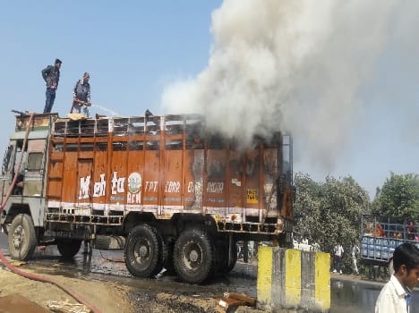A raging fire in the truck on National Highway