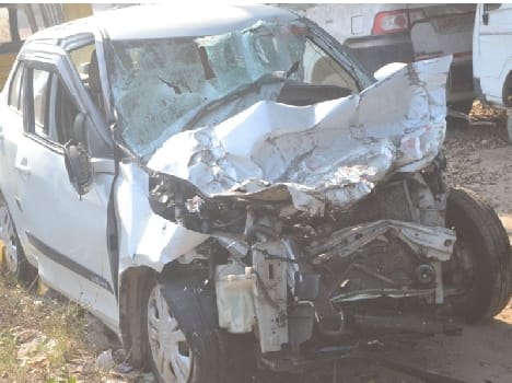Inspector dies in truck-car collision
