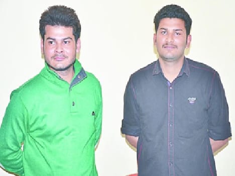 Two youths caught who threw ink