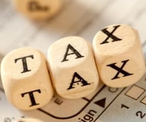 charging tax to Online booking of taxis 