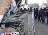 Collided with trees and bridge Upturned car, driver injured