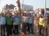 Vegetable vendors Burned effigies of EO
