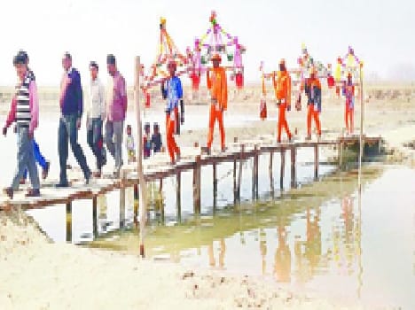 The villagers made a temporary bridge over the river